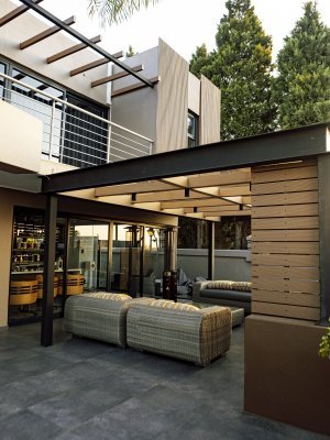 Modern architectural design: The Shazi residence in Fourways, Johannesburg is a contemporary home that underwent a façade renovation for an upgrade that would highlight the entrance, embrace natural elements and bring abundant natural light into the study, office, and children’s play area. 